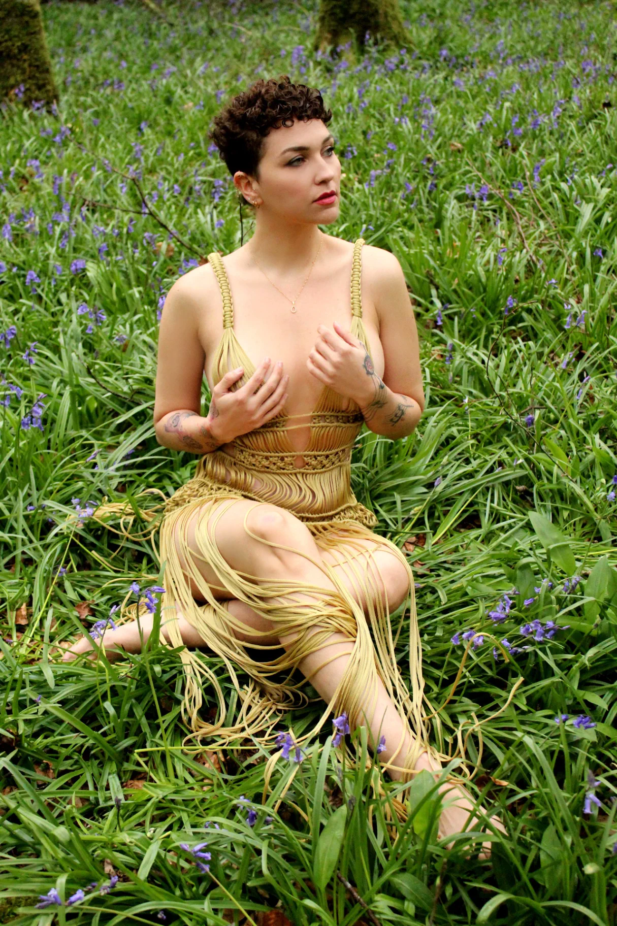 Mel, bodyworker and holistic therapist, among the bluebells near her Co. Leitrim studio